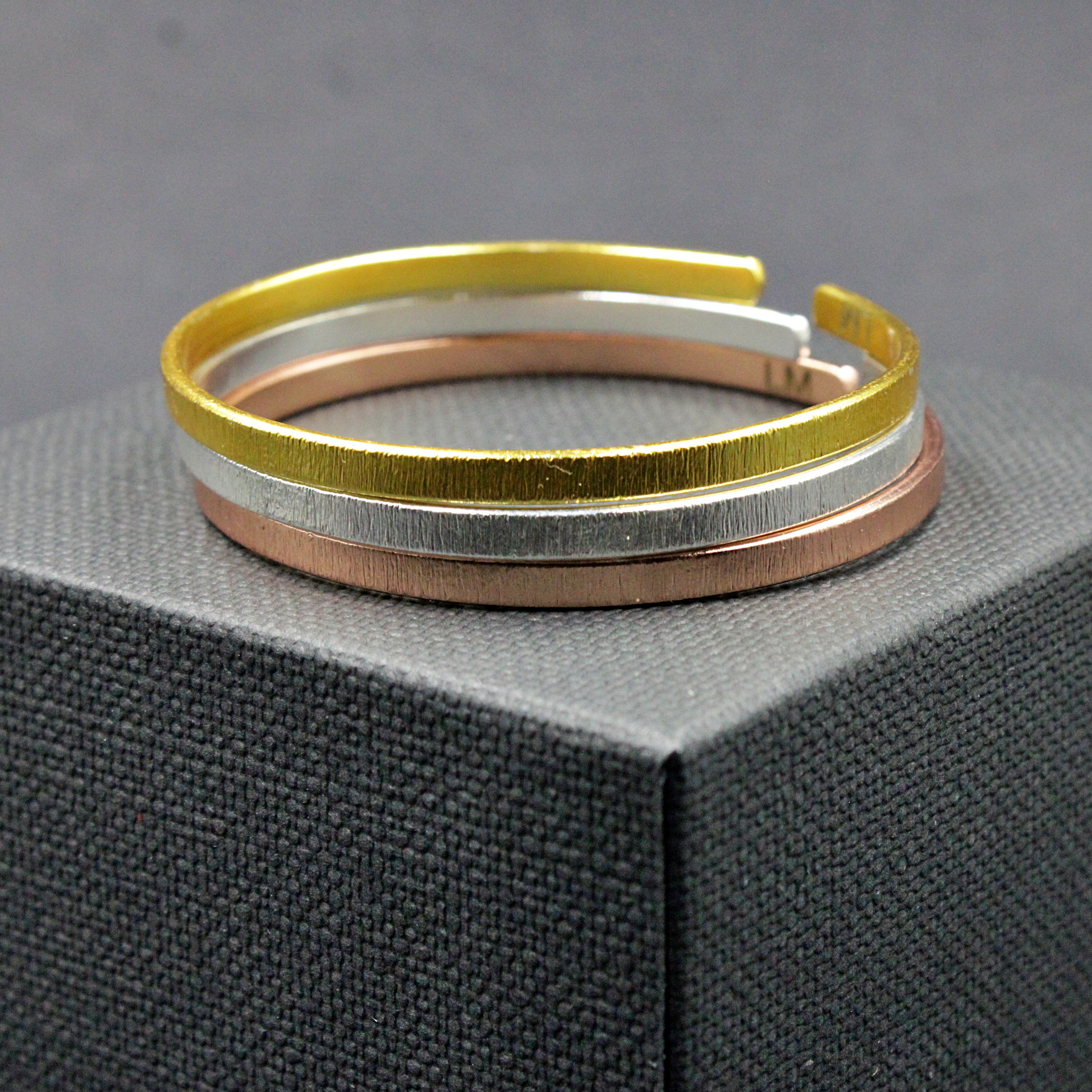 Set of gold and silver plated bracelets LOVE MONEY HEALTH